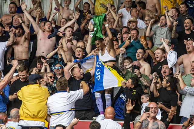 CELEBRATIONS: Raphinha joins in with the Leeds United away fans after playing a goalscoring part in their win at Brentford, which could prove his final appearance