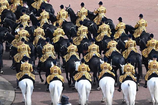 The Royal Procession leaves Buckingham Palace for the Trooping the Colour ceremony at Horse Guards Parade, central London.