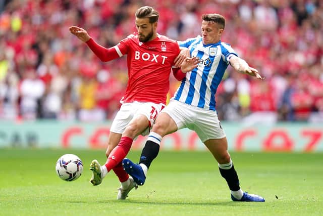 Nottingham Forest's Philip Zinckernagel (left) and Huddersfield Town's Jonathan Hogg (right) battle for the ball during the  Championship play-off final at Wembley. Picture: John Walton/PA