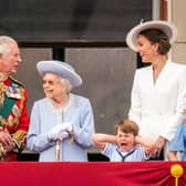 The Prince of Wales, Queen Elizabeth II, Prince Louis, the Duchess of Cambridge and Princess Charlotte on the balcony of Buckingham Palace after the Trooping the Colour ceremony yesterday. Photo: PA/Aaron Chown