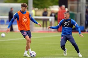 YORKSHIREMEN: Kalvin Phillips faces Man City’s John Stones in England training as the Leeds United man may ponder if he wants to join a club of similar ilk. Picture: Nick Potts/PA Wire.