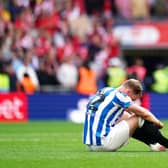 PAIN AND DESPAIR: Huddersfield Town's Tom Lees looks dejected after defeat to Nottingham Forest in the Sky Bet Championship play-off final at Wembley Stadium last Sunday Picture: John Walton/PA