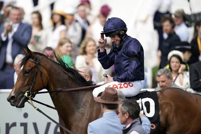 Tuesday's day: Ryan Moore reacts after winning the Cazoo Oaks on Tuesday. Picture: Andrew Matthews/PA Wire.