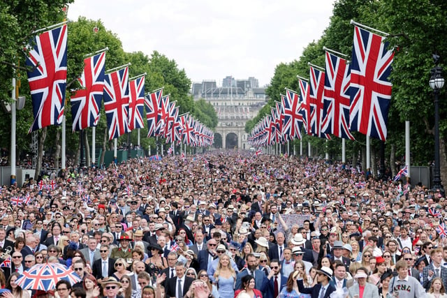 Members of the public fill The Mall as they walk towards Buckingham Palace, ahead of a flypast, during the Queen's Birthday Parade, the Trooping the Colour, as part of Queen Elizabeth II's platinum jubilee celebrations.