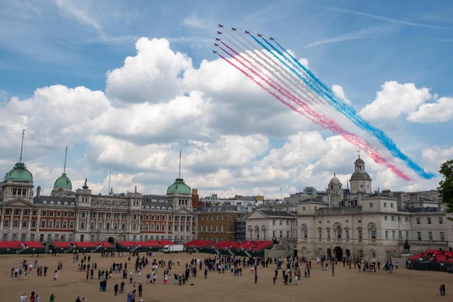The RAF Red Arrows perform a flypast over Horseguards Parade as part of the celebrations for Her Majesty's birthday and Platinum Jubilee.