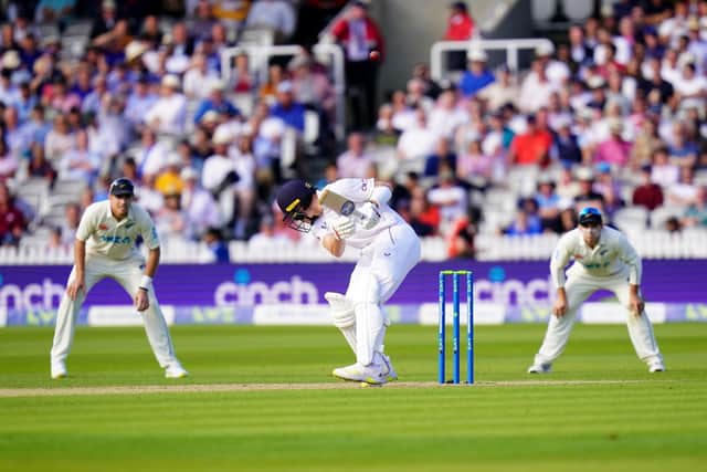 Bounced out: England's Matty Potts is hit by a bouncer and is caught out by New Zealand's Daryl Mitchell as England collapsed in reply. Picture: Adam Davy/PA Wire.