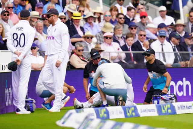 Painful blow: England's Jack Leach is treated for concussion after a fall while fielding and was forced to pull out of the game. Picture: Adam Davy/PA Wire.