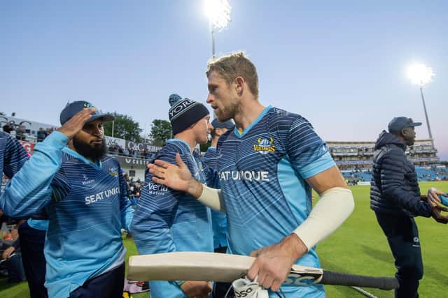 Yorkshire Vikings' Adil Rashid congratulates David Willey on his 75 not out after victory over Durham. (Picture: Allan McKenzie/SWPix.com)