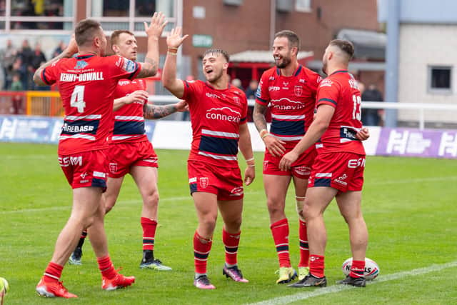 Let's celebrate: Ben Crooks and his Hull KR team-mates celebrate one of the centre's tries. Picture by Will Palmer/SWpix.com