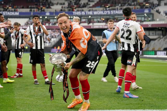 Grimsby Town's Jordan Maguire-Drew celebrates at full time after their victory during the Vanarama National League play-off final at the London Stadium, London. Picture: Tim Goode/PA Wire.