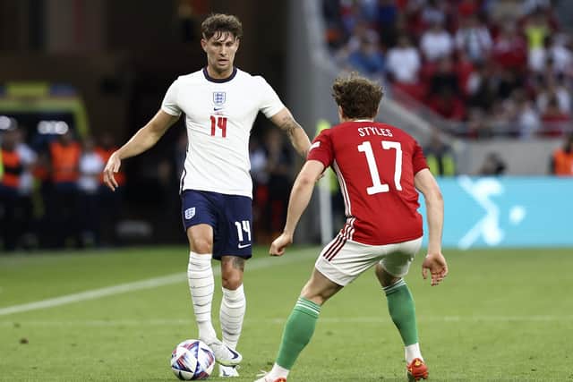 Barnsley boys: England's John Stones (left) and Hungary's Callum Styles battle for the ball during the UEFA Nations League match at the Puskas Arena, Budapest. (Picture: Trenka Attila/PA Wire)
