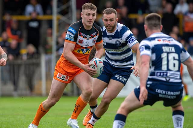 Jake Trueman tries to break through for Castleford Tigers against Wigan Warriors. (Picture: Bruce Rollinson)