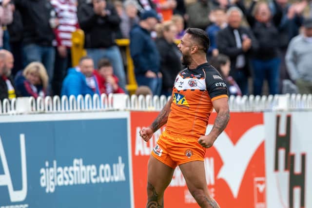 Kenny Edwards celebrates scoring the Tigers second try aainst Wigan (Picture: Bruce Rollinson)