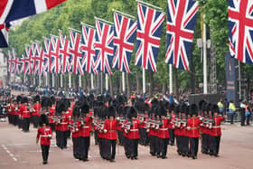 The Queen's guards march during the Platinum Jubilee Pageant in front of Buckingham Palace, London, on day four of the Platinum Jubilee celebrations. Picture date: Sunday June 5, 2022.