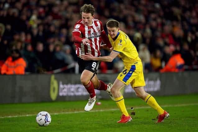 Blackburn Rovers' Darragh Lenihan battles for the ball with Sheffield United's Sander Berge in the Championship game at Bramall Lane earlier this year. Picture: Mike Egerton/PA.