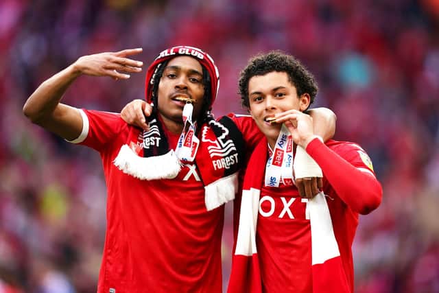Nottingham Forest's Djed Spence (left) - on loan from Middlesbrough - and Brennan Johnson celebrate after winning the Championship play-off final against Huddersfield Town at Wembley Picture: John Walton/PA
