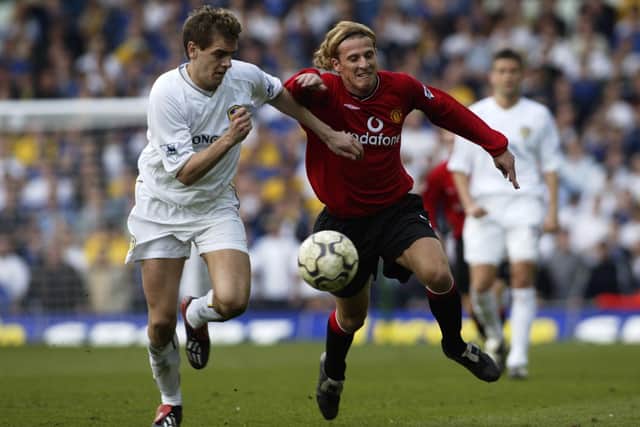 Leeds United's  Jonathan Woodgate battles with Manchester United's Diego Forlan back in 2002. Picture: Laurence Griffiths/Getty Images