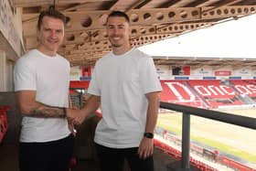 Gary McSheffrey welcomes Tommy Rowe after signing a two year contract. Picture: Howard Roe/AHPIX Ltd