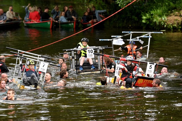 Teams struggle to keep their beds afloat at the deepest part of the river