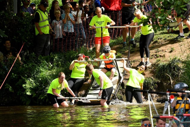 Competitors plunge into the River Nidd