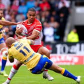 St Helens' Will Hopoate is tackled by Hull Kingston Rovers' Dean Hadley and Luis Johnson. Picture: PA