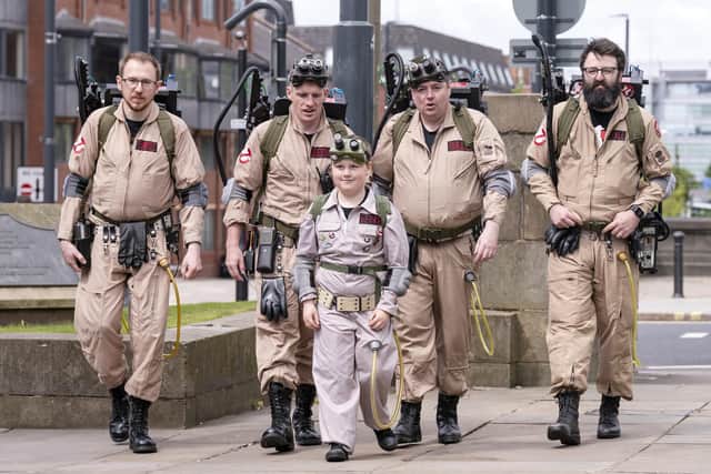 George Hinkins, eight, from Harrogate with members of the East Midlands Ghostbusters Society