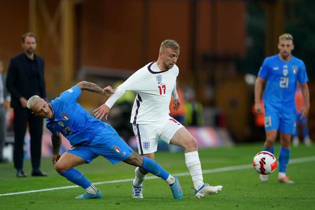 England's Jarrod Bowen (right) and Italy's Federico Dimarco battle for the ball during the UEFA Nations League match at  Molineux Picture: Zac Goodwin/PA