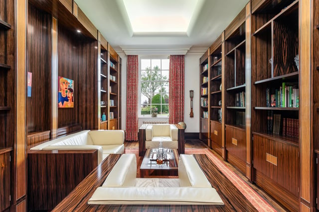 Furniture designer Neal Jones was commissioned to build the fitted library and the adjoining study. They are accessed by a hidden door and are fitted out in Makassar ebony and satinwood with accent nickel trim.