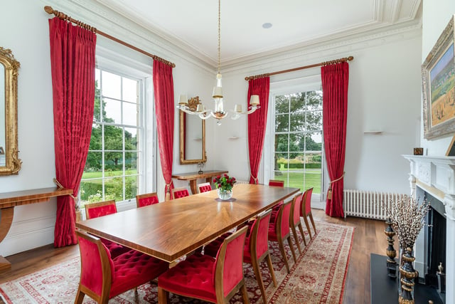 A traditional, formal dining room decorated in Georgian colours