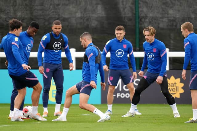 Left to right, England's Harry Maguire, Marc Guehi, Kyle Walker, Conor Coady, Kieran Trippier, Jack Grealish and James Ward-Prowse during a training session at the Sir Jack Hayward Training Ground, Wolverhampton. Picture: PA