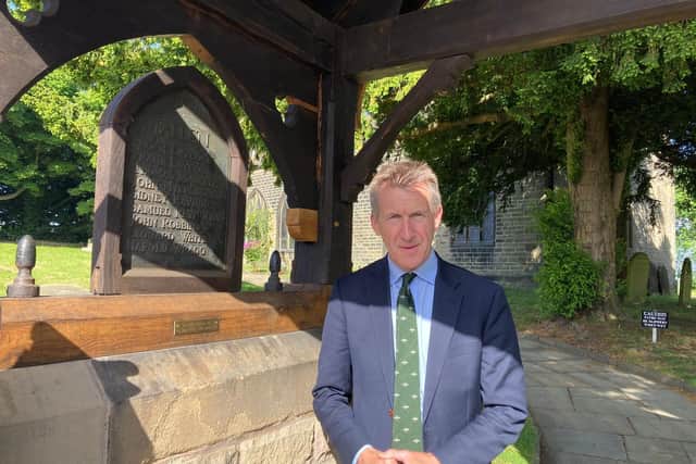 Dan Jarvis by the plaque to Sergeant Ian McKay at Wortley Parish Church