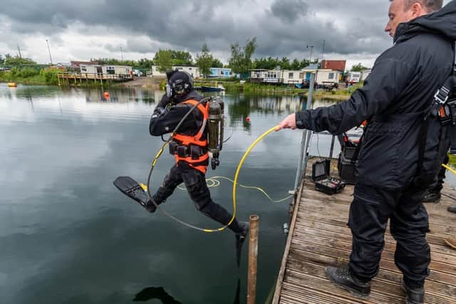 Members of the Regional Marine and Underwater Police Search Unit taking part in a training operation  to recover a firearm held at Scuba Dream Eight Acre Lake dive site, Mires Lane, Brough, near North Cave.