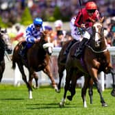 Double up: The Ridler ridden by jockey Paul Hanagan (right) on their way to winning the Norfolk Stakes at Royal Ascot for Malton's Richard Fahey - the second year running that jockey and trainer won the race. Picture: Adam Davy/PA Wire.