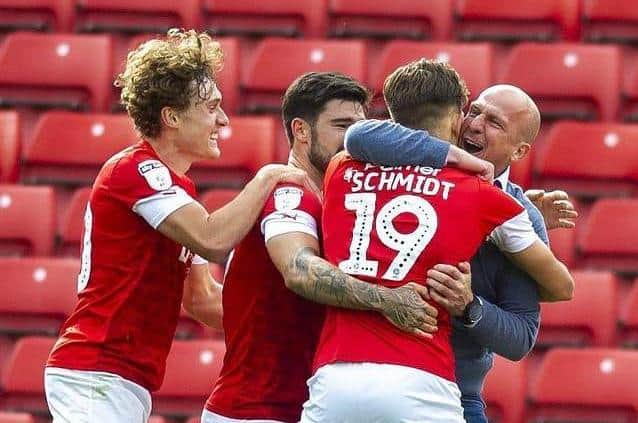 Ex-Barnsley manager Gerhard Struber celebrates with substitute Patrick Schmidt after he grabbed a late winning goal against Nottingham Forest in July 2020. Picture: Tony Johnson.