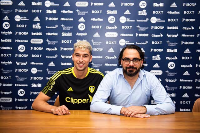 New Leeds United signing Marc Roca, pictured with director of football Victor Orta. Picture courtesy of Leeds United AFC.