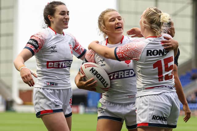 Georgia Roche celebrates her first try with team-mates. (Picture: SWPix.com)