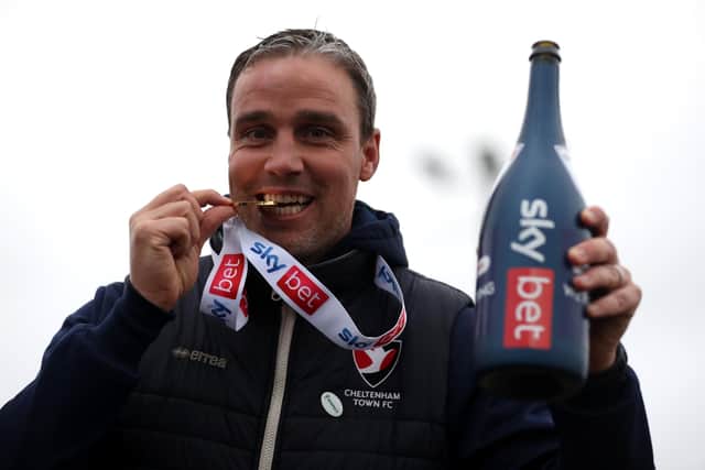 Cheltenham Town manager Michael Duff celebrates winning the Sky Bet League Two championship in 2021 (Picture: PA).