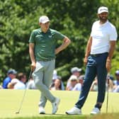 WAITING GAME: Sheffield's Matt Fitzpatrick and the USA's Dustin Johnson wait on the seventh green at the US Open Brookline Picture: Andrew Redington/Getty Images