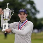 Matthew Fitzpatrick, of England, poses with the trophy after winning the U.S. Open golf tournament at The Country Club, Sunday, June 19, 2022, in Brookline, Mass. (AP Photo/Charles Krupa)