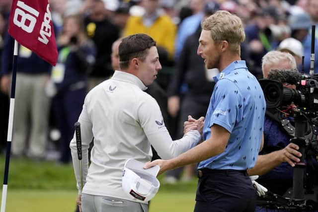 Matthew Fitzpatrick, left, of England, and Will Zalatoris meet after Fitzpatrick won the U.S. Open golf tournament at The Country Club (AP Photo/Charlie Riedel)