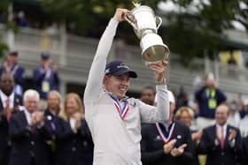 Matt Fitzpatrick, of England, celebrates with the trophy after winning the US Open.  (AP Photo/Charles Krupa)