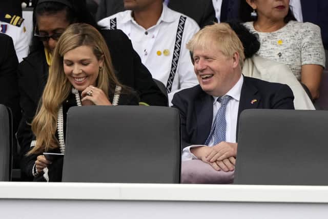Prime Minister Boris Johnson and his wife Carrie Johnson during the Platinum Jubilee Pageant in front of Buckingham Palace