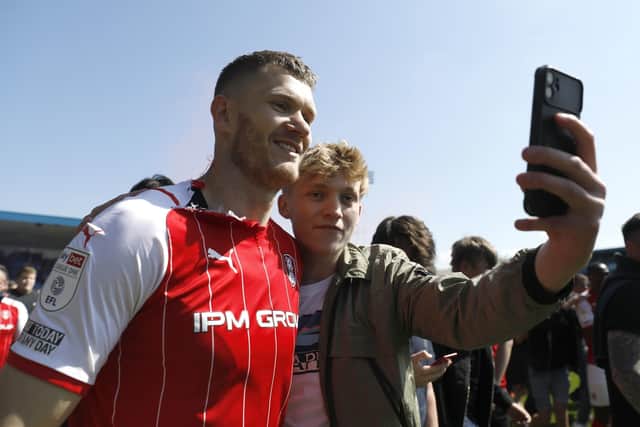Rotherham United's Michael Smith (left) poses for a photo with a fan after the final whistle. WIll he still be a Millers player next season (Picture: PA)