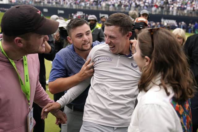 Sheffield's Matthew Fitzpatrick, of England, celebrates with his family after winning the U.S. Open golf tournament at The Country Club, Sunday, June 19, 2022, in Brookline, Mass. (AP Photo/Charles Krupa)