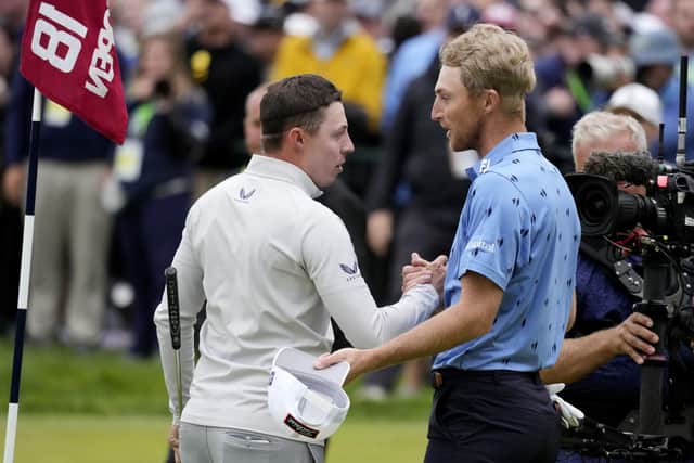 Matthew Fitzpatrick, left, of England, and Will Zalatoris meet after Fitzpatrick won the U.S. Open golf tournament at The Country Club. (AP Photo/Charlie Riedel)