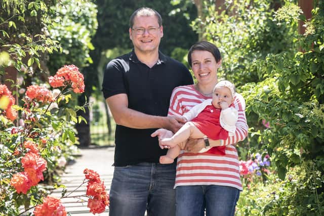 Ukrainian engineer Anton Ievsiushkin with his sister Anastasiia Ievsiushkin and her five-month-old baby in Hillsborough Park, Sheffield