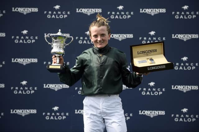 Winning smile: Hollie Doyle celebrates after becoming the first female ride to win a major European Classic. Picture: JULIEN DE ROSA / AFP)