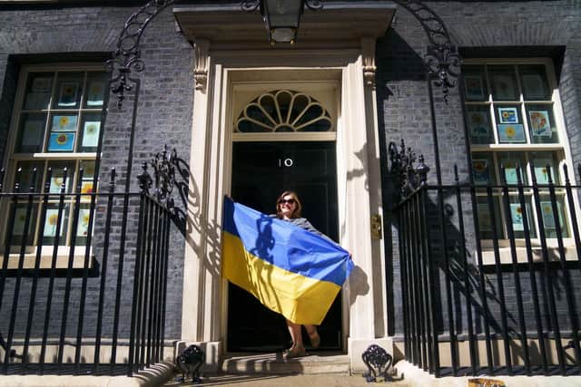 Library image of a Ukrainian refugee standing on the doorstep of 10 Downing Street after meeting with Prime Minister Boris Johnson. Picture: PA