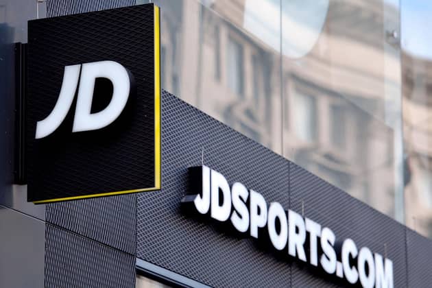 Scandal-hit retailer JD Sports Fashion has unveiled a record £947.2m annual profit haul.