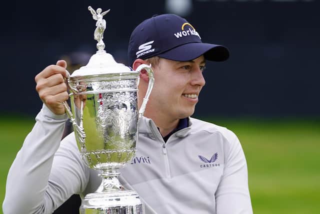 Matthew Fitzpatrick poses with the trophy after winning the US Open at BrooklineAP/Julio Cortez